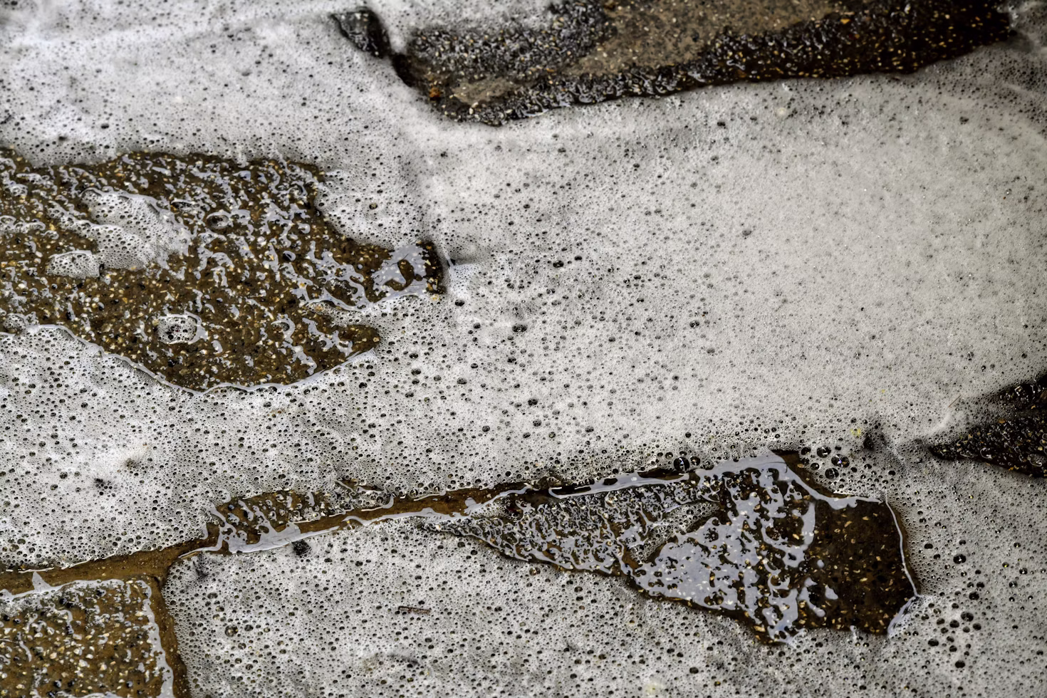 Apollo Surface Solutions pressure cleaning a concrete driveway